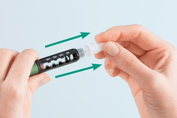 Needle handling - pull the needle container off and set it aside